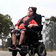 Dean Crane sitting in his wheelchair