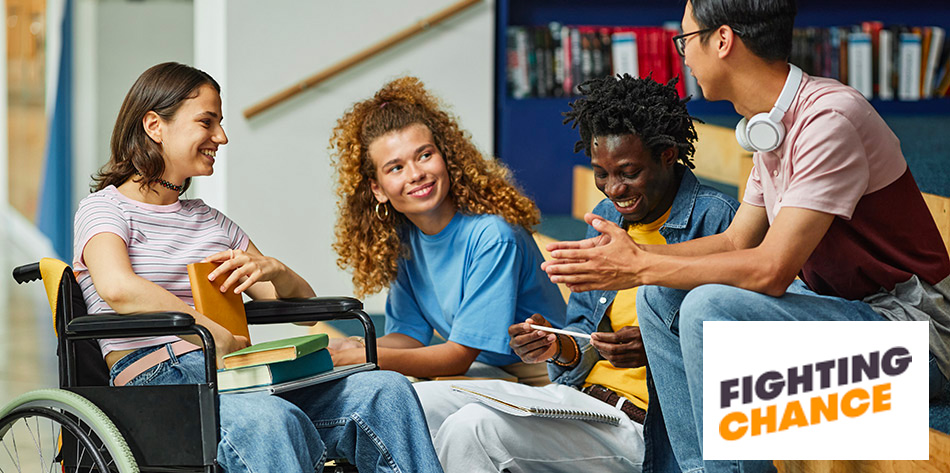 Group of young people chatting, one in a wheelchair