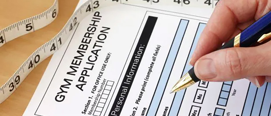 Gym membership application form with a pen ready to complete it