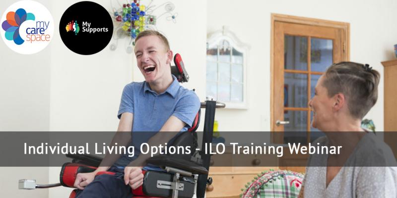 Happy young man in a wheelchair with a friend
