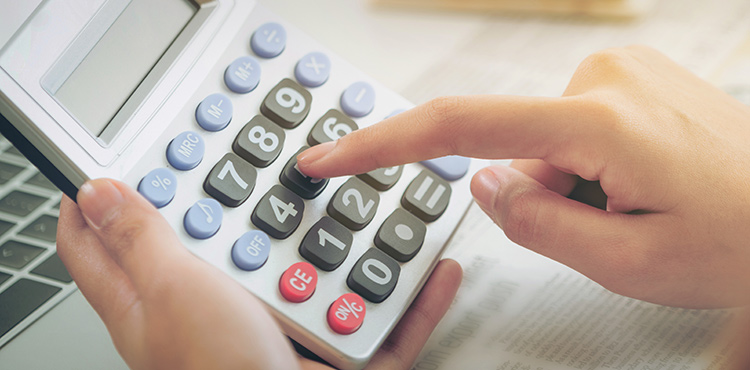 Person clicking a calculator button