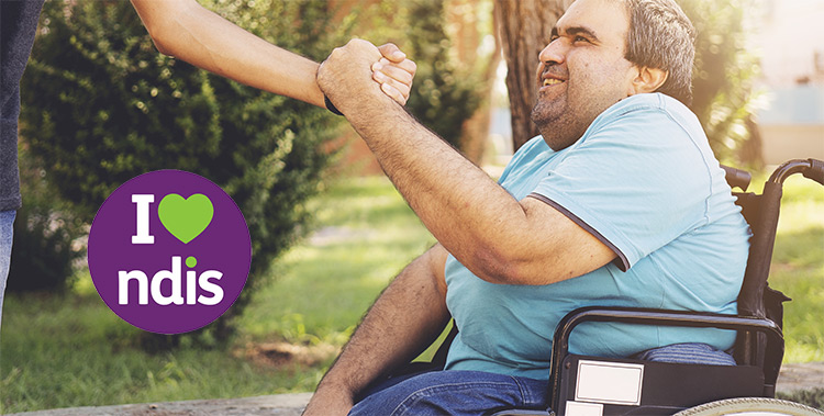 Man in wheelchair shaking hands with strong grip