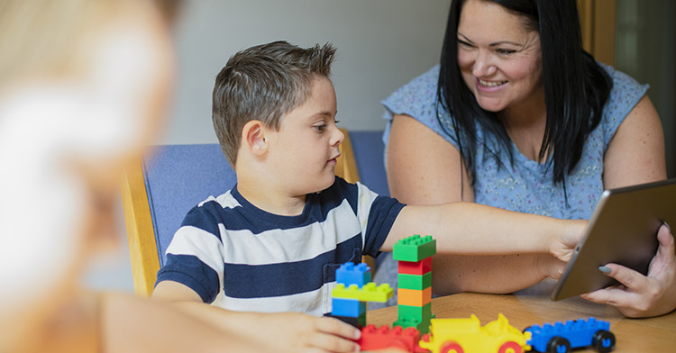 Support worker with child