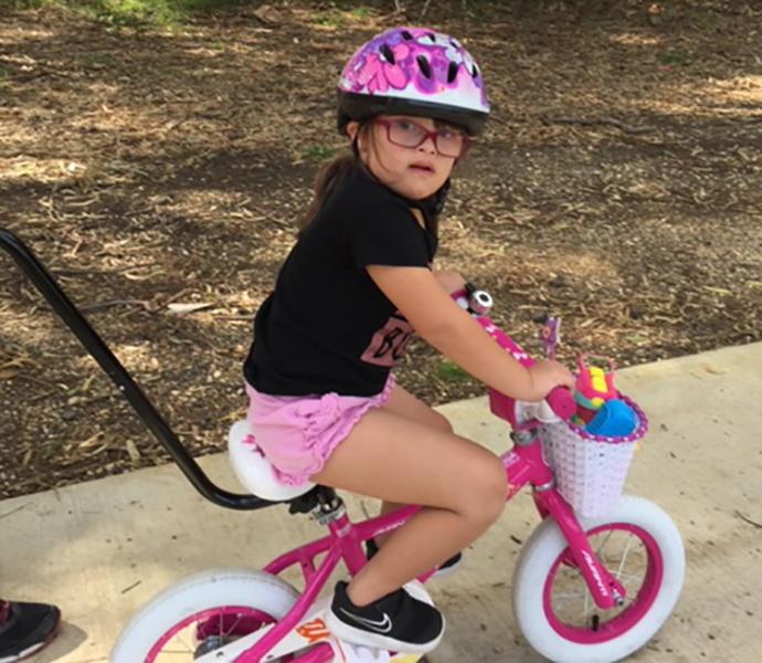 Maia on her bike