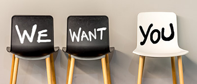 3 chairs with I want you written on them