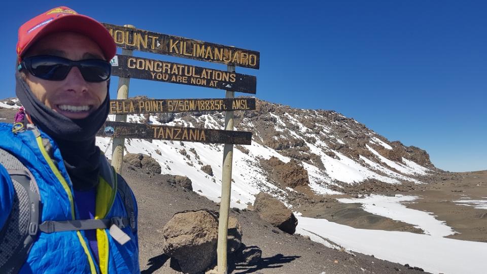 Steve standing at Stella point on Mount Kilimanjaro