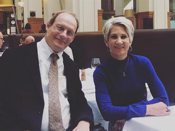 Duncan and Nicole seated at a table