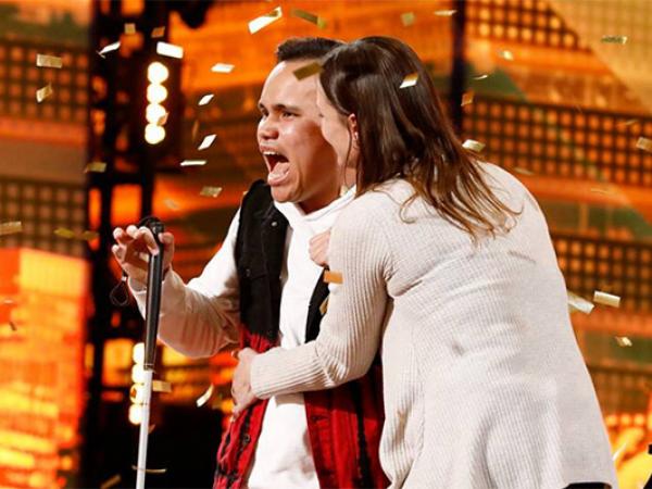 Kodi Lee covered in gold pieces winning the golden buzzer